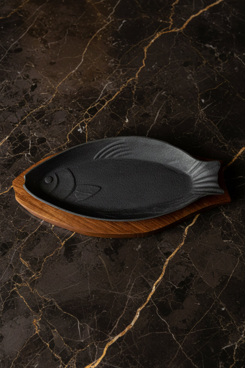 Iron Fish Sizzler Plate with Wood Liner On Black Marble