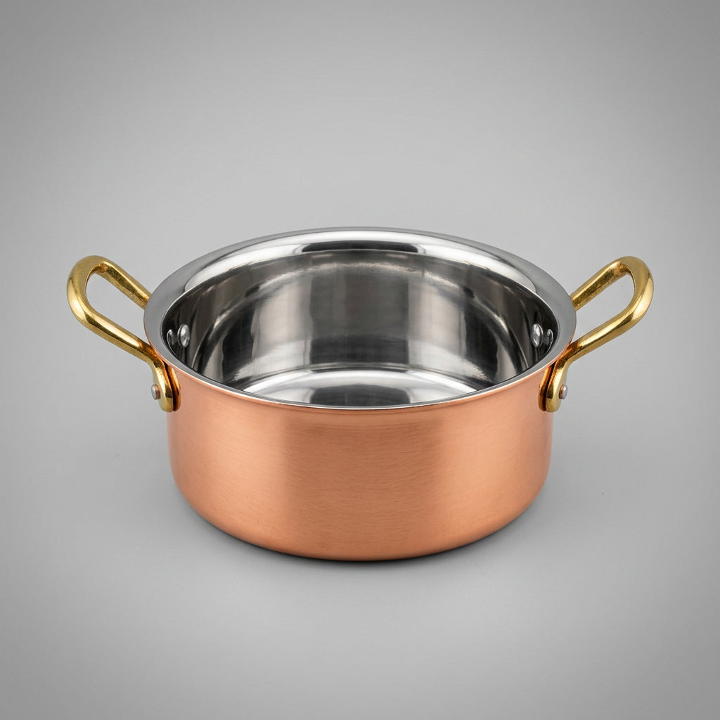 Nishi 18 oz hammered copper-coated stainless steel serving pot with two brass handles