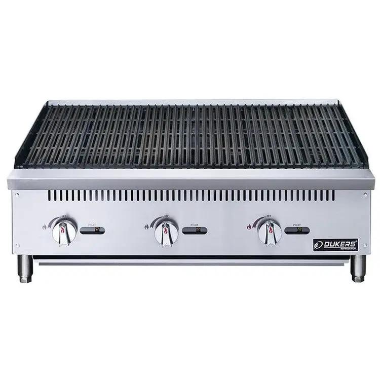 Dukers DCRB36 char-broiler side angle view showing 36-inch stainless steel body and 3 burner controls